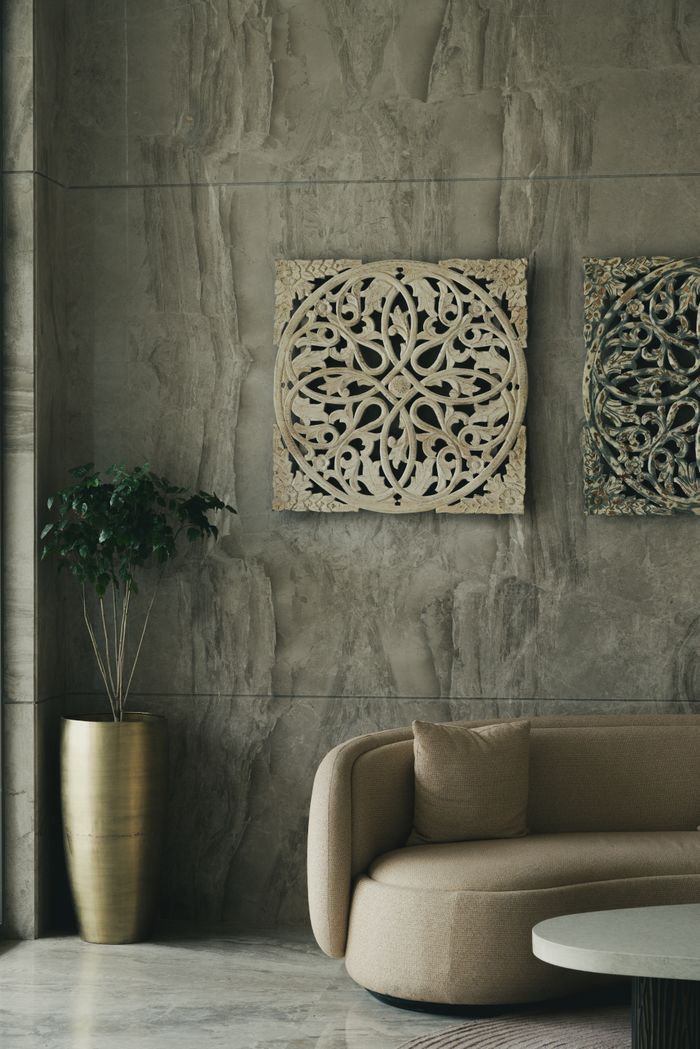 Services Sophisticated living room featuring modern decor, neutral tones, and natural light.